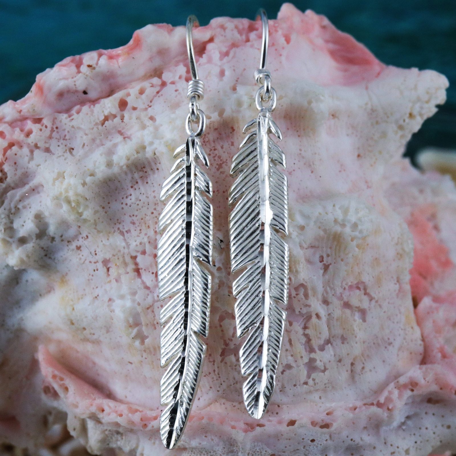 silver dangle feather earrings